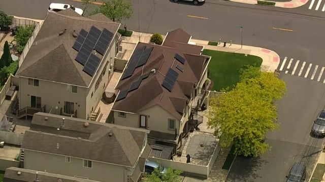 An aerial view of solar panels on two Staten Island homes. 