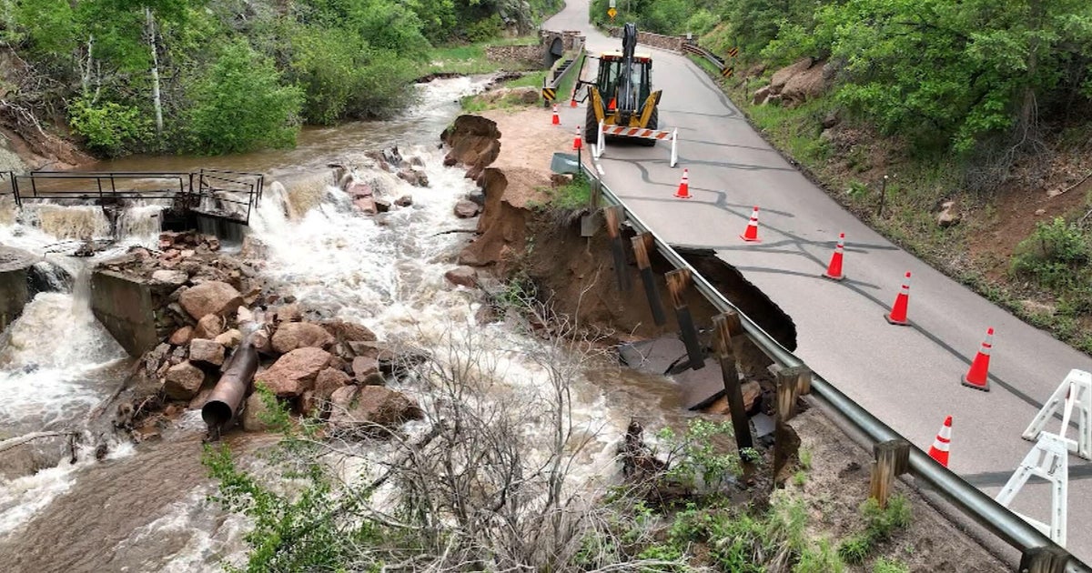 Heavy rain washes out road in foothills west of Colorado Springs 