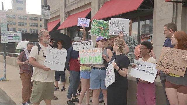 About 12 workers protest outside World Cafe Live holding signs in Philadelphia 